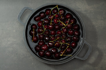 Juicy seasonal black cherries close-up