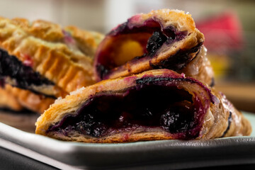 Blueberry and Apricot Jam Triangles Pie. Puff Pastry. Dessert