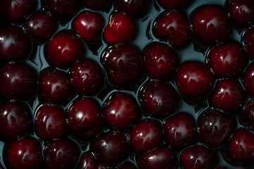 Juicy seasonal black cherries close-up