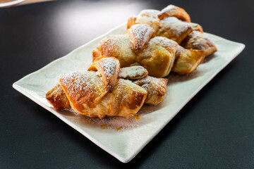 Croissant with caramel. Puff pastry. Dessert
