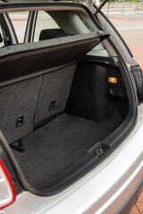 Obraz premium Open trunk in a black textile car
