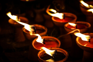 Candle flame ,Light, Lamp, Oil lamp, Light bulb, Torch, Candle wick, Wick, Night, Dark, Dusk, Bright, Bokeh, Point, Light bulb ,candle dripping ,Floating, Loy Krathong tradition, Sukhothai, Thailand