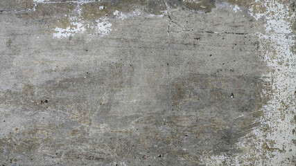 Rough concrete wall texture with visible cracks and dirt. Weathered surface great for grunge overlays, aged building references, or construction material design.