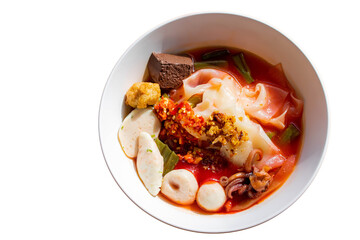 Thai yen ta fo noodle soup with seafood and chili
