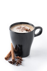 Chai Latte in Black Mug with cinnamon and star anise isolated on white background