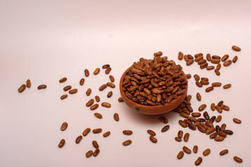 Fresh Organic Raw Rajma in Small Clay Pot on White Background