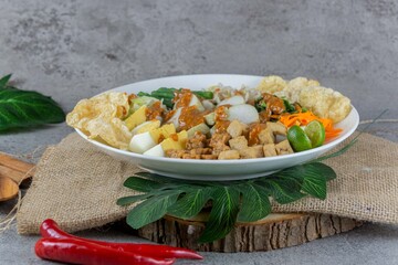 Traditional Indonesian Gado-Gado Salad with Peanut Sauce, Vegetables, and Boiled Egg
