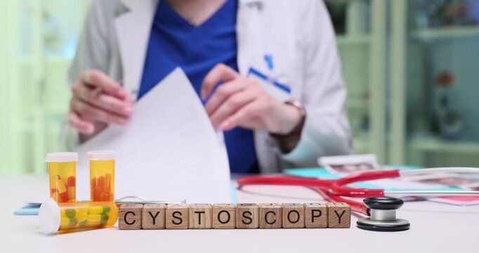 A healthcare professional preparing for a cystoscopy procedure with necessary tools and documentation.