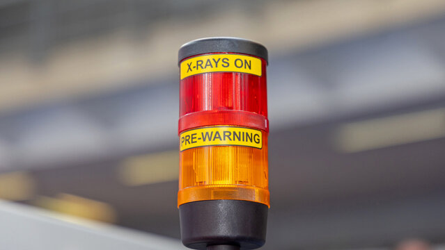 Red and Amber Alert Caution Pre Warning Signal X Rays On at Machine