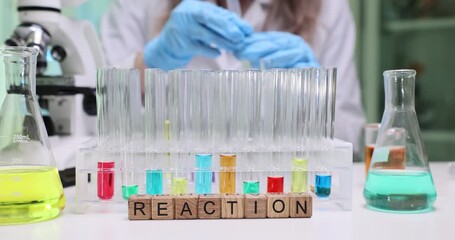 A vibrant lab scene showing colorful chemical reactions in test tubes and flasks with various liquids - Powered by Adobe
