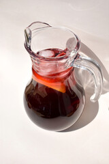 Refreshing Red Sangria in Glass Pitcher with Ice and Fruit