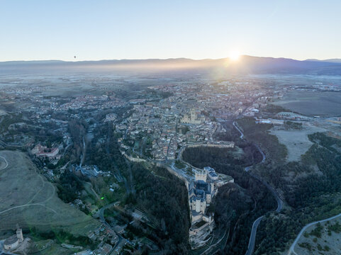 Aerial view of the Alc&Atilde;&iexcl;zar of Segovia, a stone fortification, stands guard over a city bathed in the soft glow of the rising sun, Segovia, Castilla y Le&Atilde;&sup3;n, Spain.