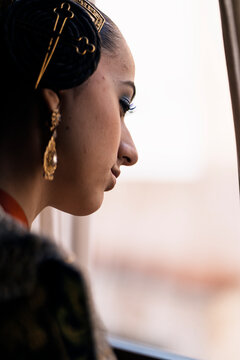 Traditional Spanish fallera in ceremonial attire