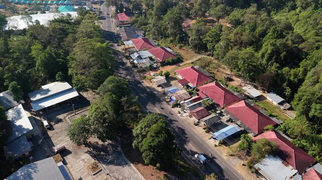 Overhead Drone Shot of Chia Chet bar and shops, Koh Chang, with main roads and buildings
