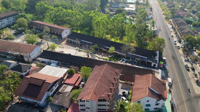 Overhead Drone Shot of Chia Chet Plaza, Tourist Area, Koh Chang, with main roads and buildings