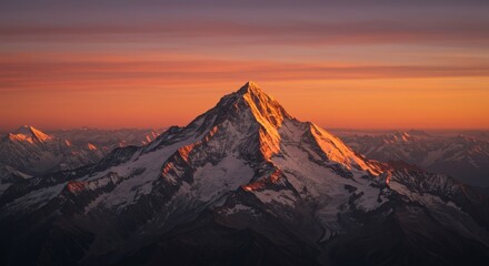 Gasherbrum IV glowing at sunrise, warm tones