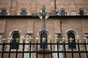 Metal cross near Saint Sernin Cathedral in Toulouse