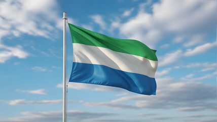Vibrant Sierra Leone flag waves proudly against a clear blue sky with fluffy clouds, symbolizing national pride and freedom.