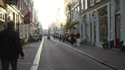 Blurred view of a man walking through a vibrant european city street with intricate architecture and bustling atmosphere in the background under warm sunlight.