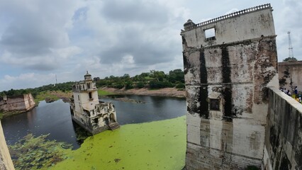 The Serene Rani Padmini Mahal: A Queen's Palace Reflected in a Pond, Chittorgarh Fort, Rajasthan, India 