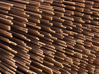 Close-Up of Bundled Metal Rods Aligned in an Industrial Setting