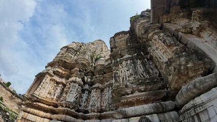 Fototapeta premium Ancient Figurines on the Walls of the Samadhisvara Mahadev Temple at Chittorgarh Fort Complex, Rajasthan , India