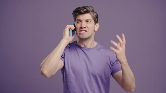 Angry Handsome Man Quarreling, Yelling Talking On Mobile Phone. Guy In Stress 