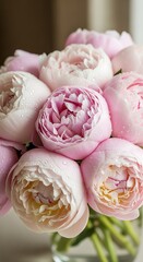 Pastel Peonies: A delicate floral arrangement showcasing the subtle beauty of peony blossoms
