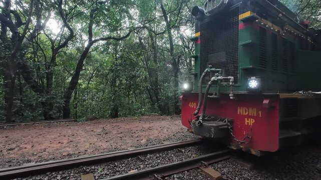 Heritage Toy Train Passing Through Scenic Tracks in Matheran Hill Station