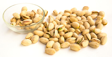roasted pistachios on white background