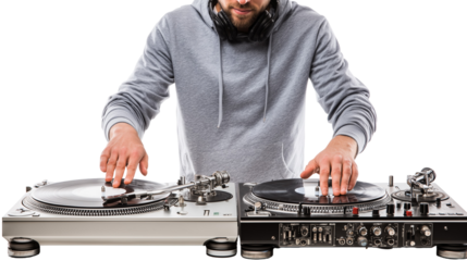 Man with headphones using two turntables