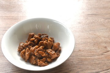 salty boiled slice dice pork meat in soy sauce on bowl