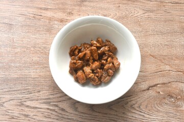 salty boiled slice dice pork meat in soy sauce on bowl