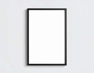 Vertical black photo frame mockup hanging on a plain white wall with space for text.