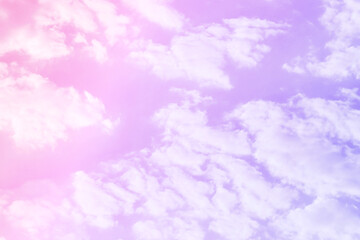 Purple pink pastel sky with cloud. Sunlight shining through the clouds. Beautiful sunrise in the morning.