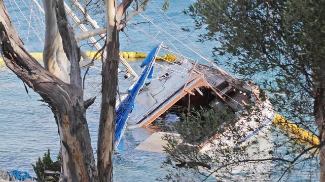 sunken yacht on the rocky coast in ithaca 
