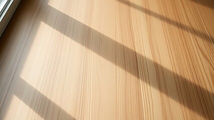 A wooden table showcasing natural grain patterns, bathed in soft side lighting for a serene aesthetic.