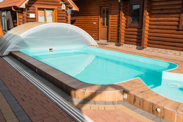 Swimming pool at a house closeup background.