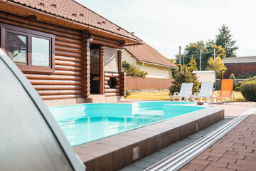 Swimming pool at a house closeup background.