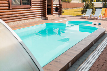 Swimming pool at a house closeup background.