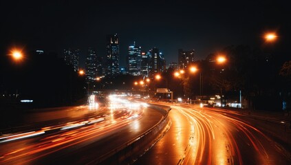 City highway at night with blurred car lights
