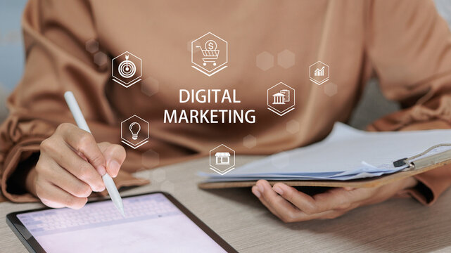 Digital marketing strategy planning with tablet and infographic icons