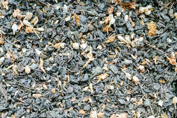 Pile of black and brown tea leaves