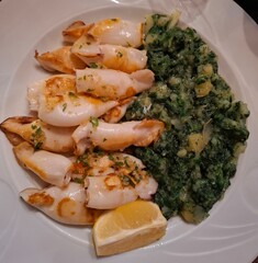 grilled squid callamari with cocket potatoes and a chard