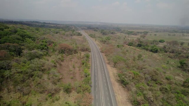 The jos&eacute; antonio p&aacute;ez highway in guanare, venezuela, showing lush landscape, aerial view