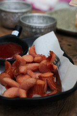 Appetizer of Fried Red Sausage with Ketchup