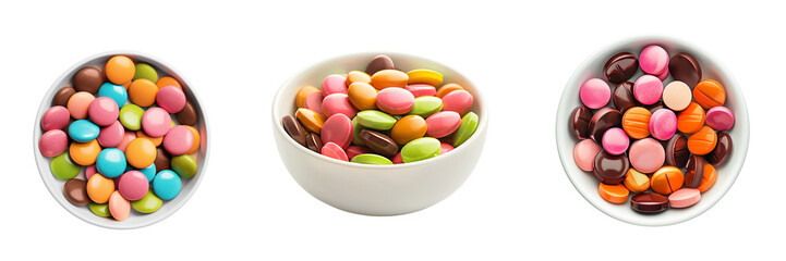 Set of colorful chocolate candy pills in white bowl isolated on transparent or white background