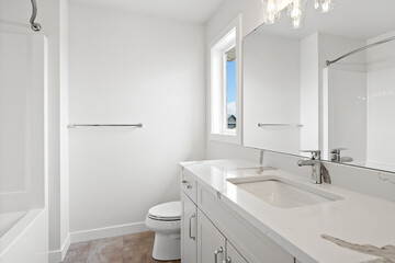 Bathroom with a white sink and toilet