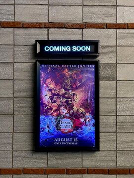Jakarta, Indonesia - August 14th, 2025 - Demon Slayer Infinity Castle or Kimetsu no Yaiba anime movie cinema wall poster banner isolated on vertical indoor wall background.
