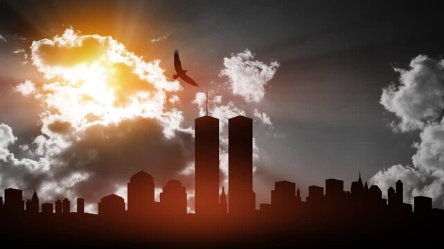 Silhouette of Towers with soaring eagle on background of black and white sky. 09.11.2001 American Patriot Day banner. Video with inscription.